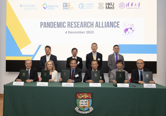 Leading global scientists from six leading institutions in four countries launched the Pandemic Research Alliance (PRA) to drive concerted research into respiratory viruses from animals to humans, improved surveillance, and new solutions to better manage the next pandemic. Joining the signing ceremony were: (front row, from left) Professor David Ho from Columbia University Irving Medical Center; Professor Sharon Lewin, Doherty Institute – University of Melbourne; Professor Wang Linfa, Duke-NUS Medical School; Professor Zhong Nanshan, Guangzhou National Laboratory; Professor Yuen Kwok-Yung, the University of Hong Kong (HKU); and Professor Zhang Linqi, Tsinghua University; witnessed by (back row, from left) Professor Roger Wu, Columbia University Irving Medical Center; Professor Chen Xinwen, Deputy Director, Guangzhou National Laboratory; Professor Chak-sing Lau, Dean of Medicine, HKU; and Mr Sim Zhimin, Director (International Partnerships and Strategy), Tsinghua Medicine, Tsinghua University.
 